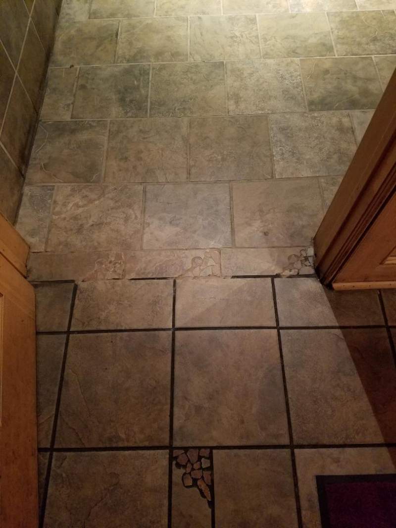 Tile and grout cleaning by Delta Carpet Cleaning